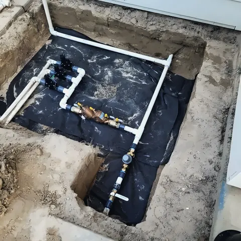 Under-slab plumbing rough-in, from PrimeTime Plumbing’s own photographs.